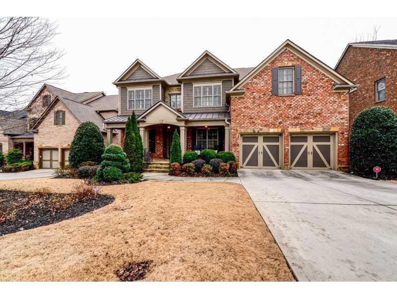 Exterior Front. This gorgeous 3 sides brick and ce