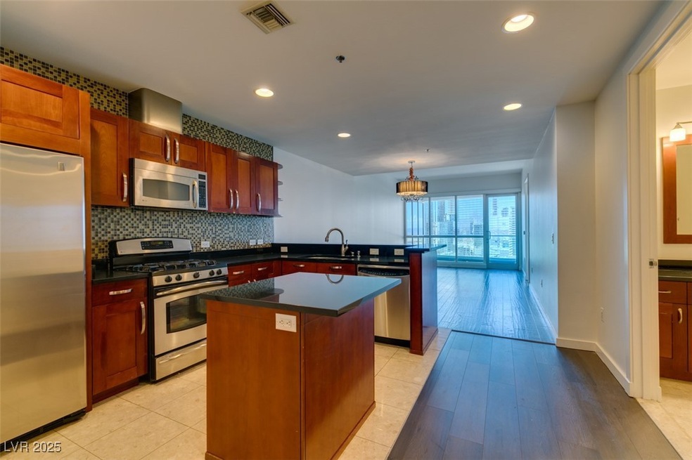 Kitchen featuring stainless steel appliances, a pe