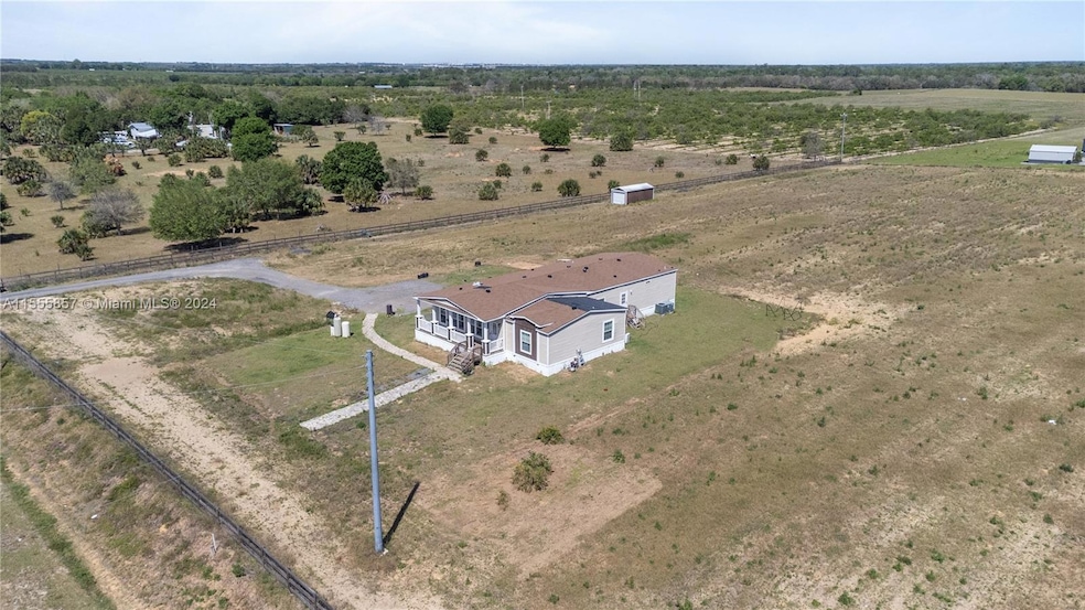 8012 Lake Hatchineha Rd, Haines City, FL 33844 - photo 1