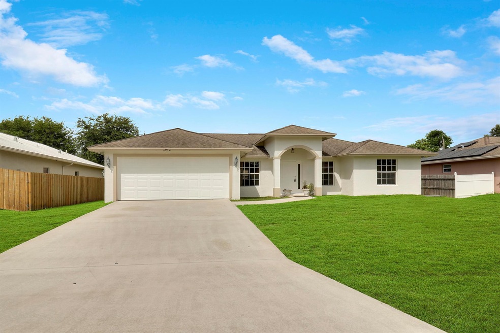 1942 SW Hampshire Ln, Port Saint Lucie, FL 34953 - photo 1