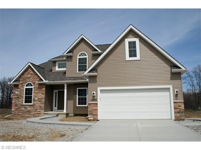 Welcome to 13196 Kensington Drive. Quality built c