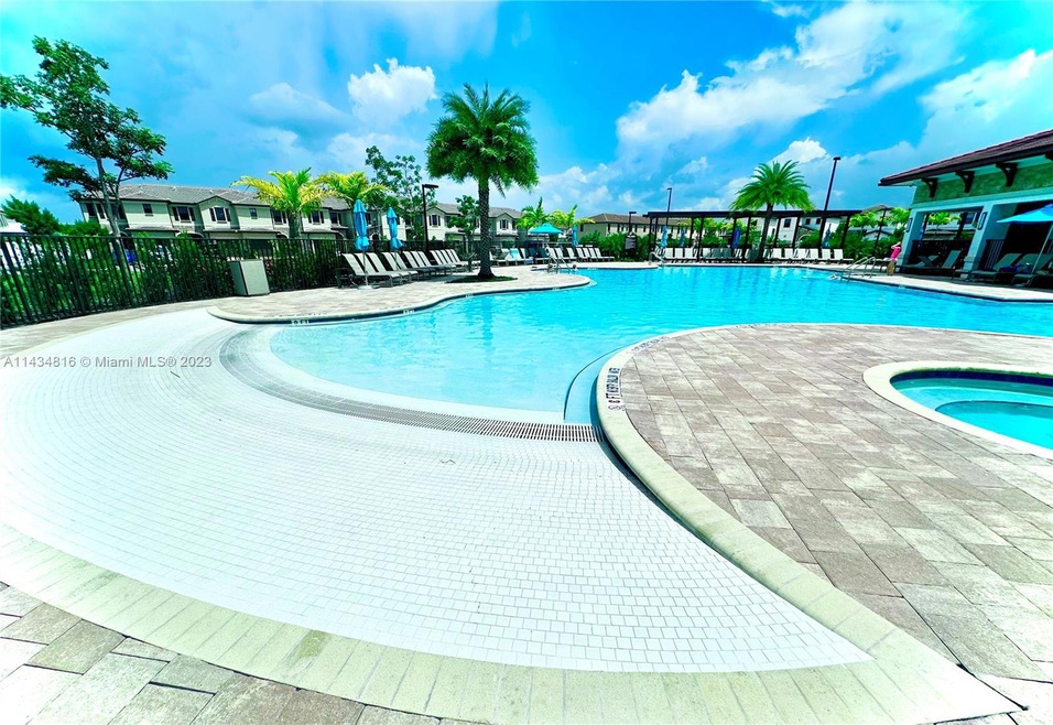 Community pool with beach-like entry