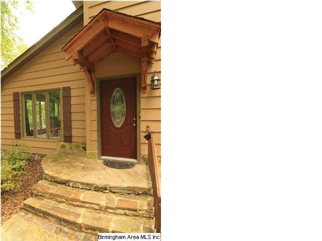 Gorgeous lake home with soaring ceilings and incre