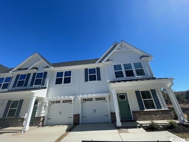 View of front of home featuring an attached garage