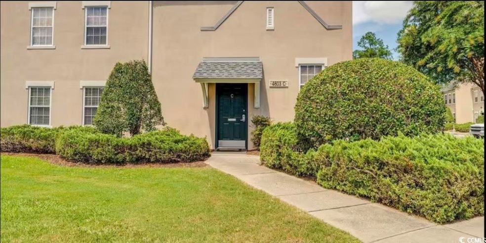 View of front facade featuring stucco siding and a