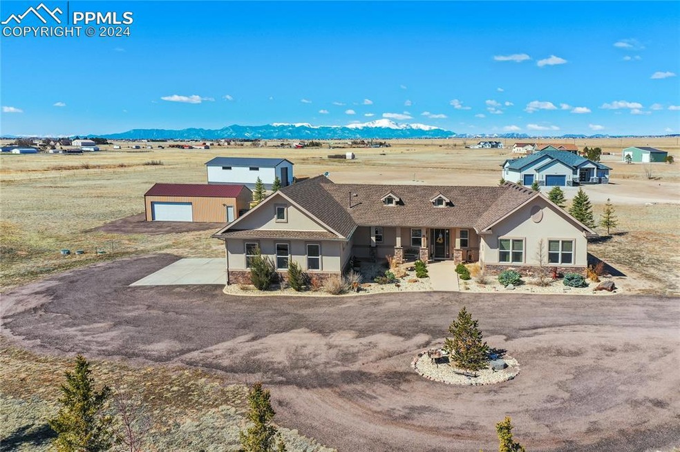 Custom Built Ranch Home sits on a 5.06-acre lot, o