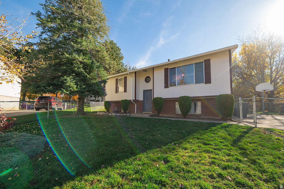 Split foyer home featuring brick siding