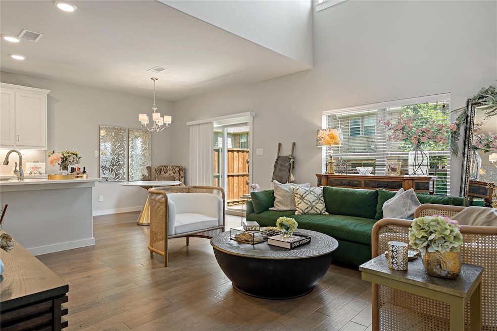 Living room with dark hardwood / wood-style floori