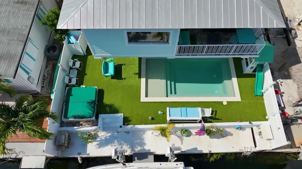 Aerial View of Pool and Dock