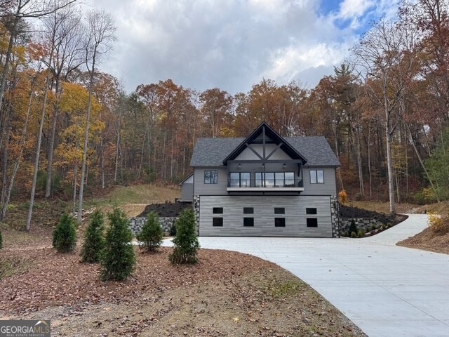 Front elevation of home and airplane hangar.
