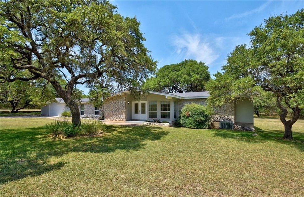 2.9 acres of privacy just 20 minutes to downtown