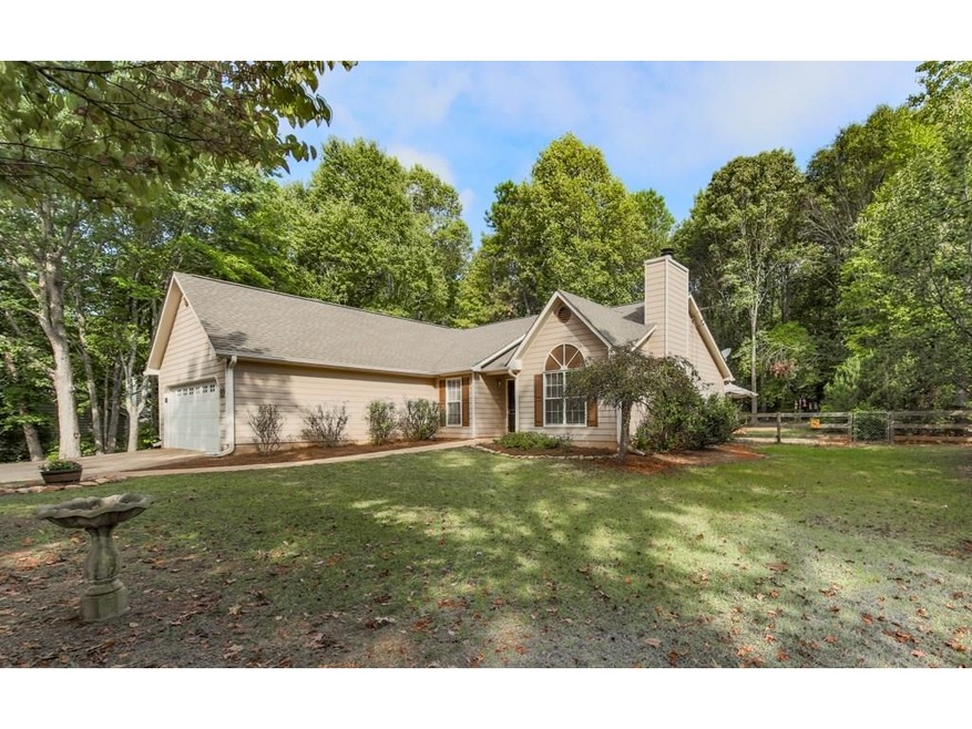 Front elevation. Stepless ranch with 2 car garage.