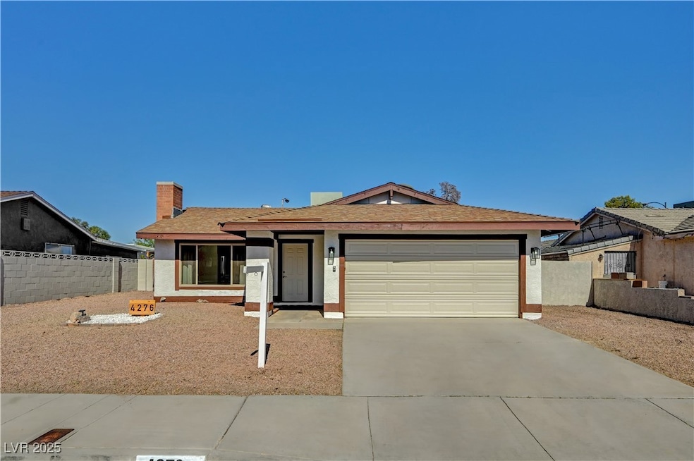 Single story home with a garage, concrete driveway, a chimney, stucco siding, and a shingled roof
