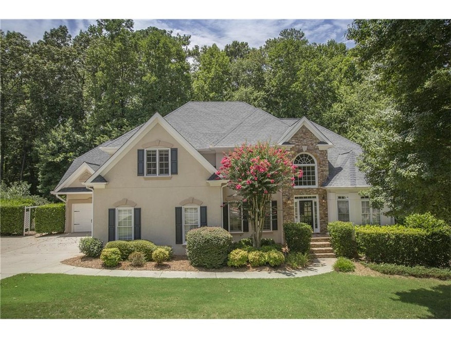 Gorgeous hard coat stucco and stacked stone home i