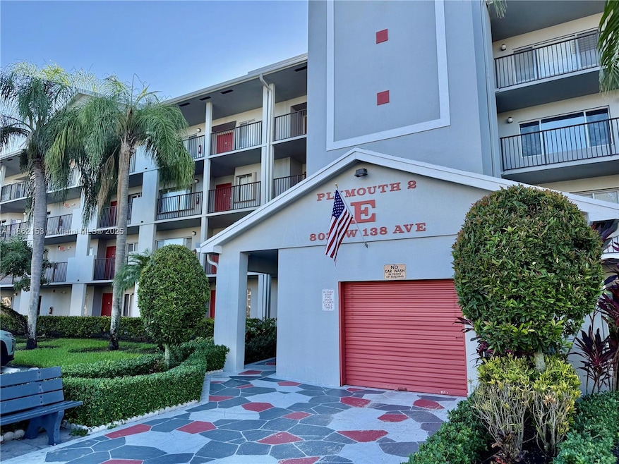 801 SW 138th Ave unit E410, Pembroke Pines, FL 33027 - photo 1