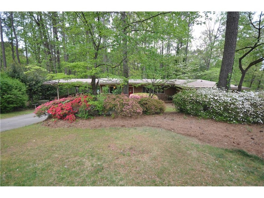 Mid Century Modern home with built up roof on .8 a