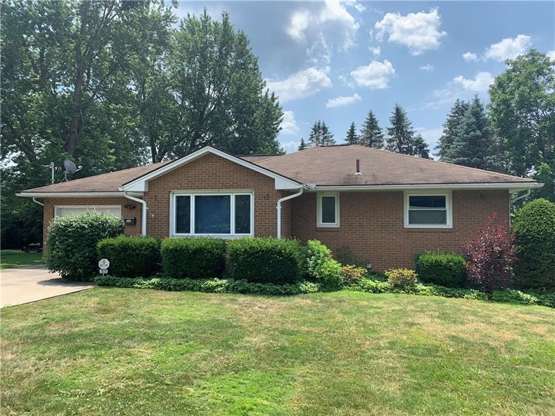 SOLID ALL BRICK HOME WITH A WALK-OUT BASEMENT TO B