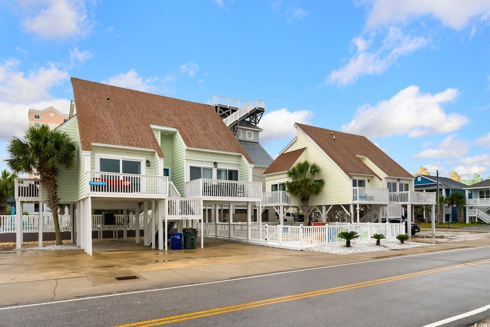 View of building exterior with a carport