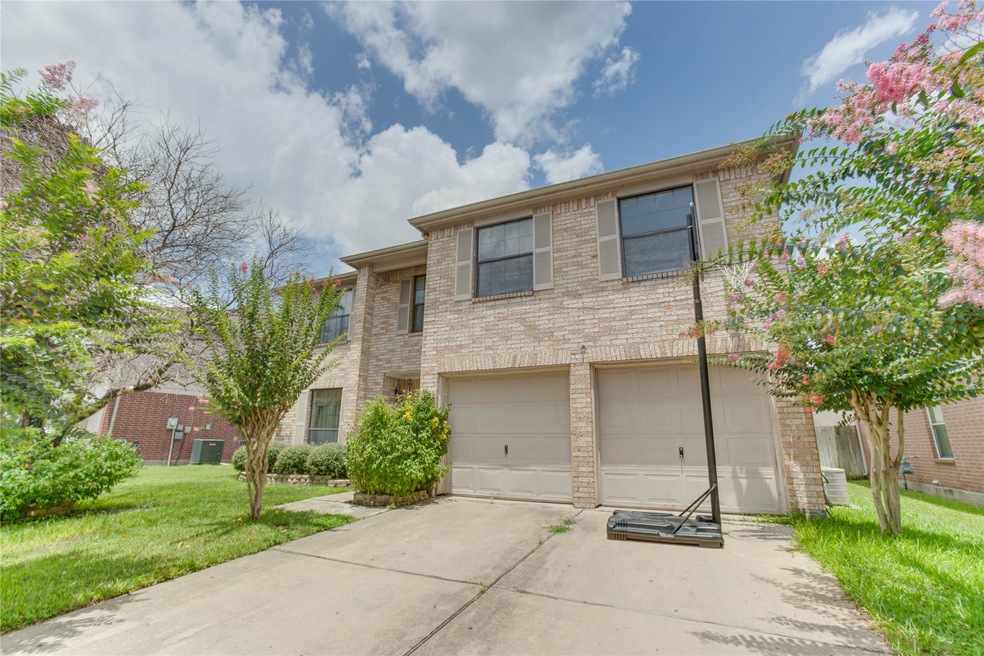 6018 Stirring Winds Ln, Houston, TX 77086 - photo 1