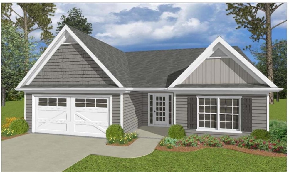 View of front of house with concrete driveway, a garage, board and batten siding, and a front yard