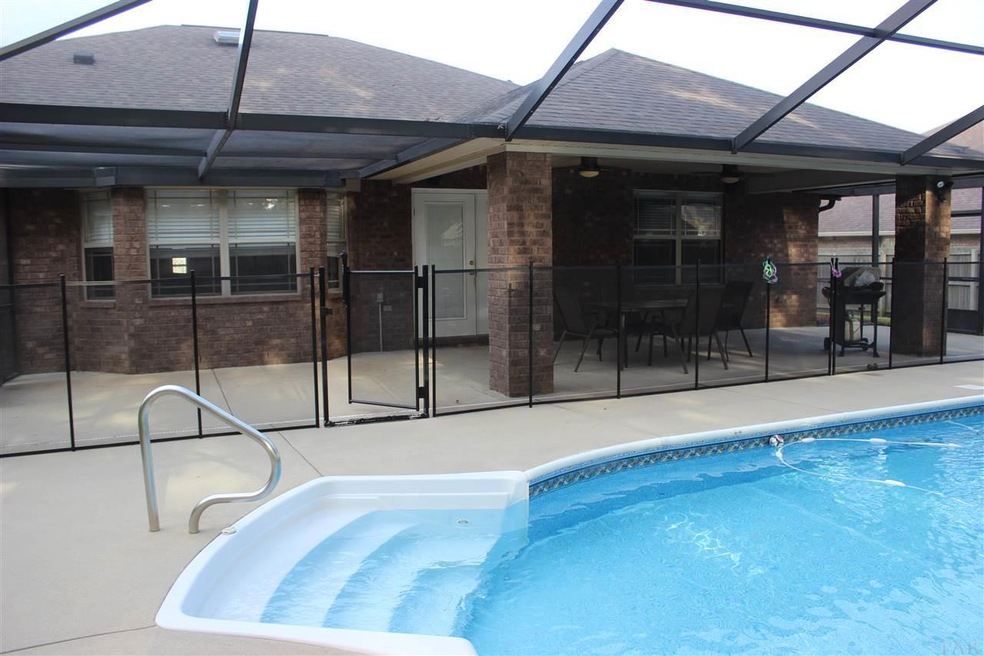 Connected to house and covered patio.