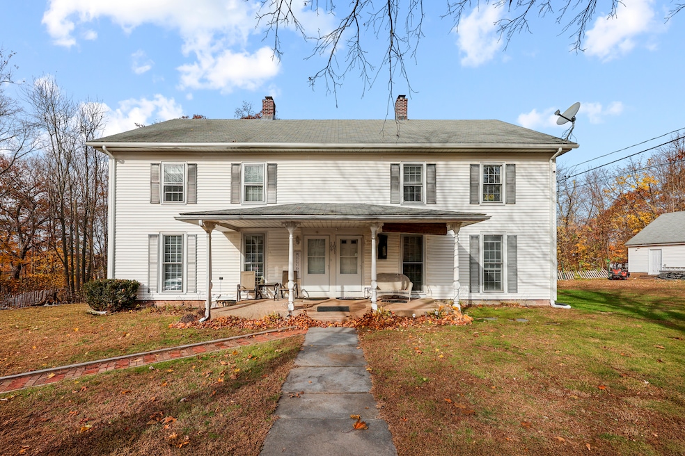 Side-by-Side 2-Family on Sweet Historical Main Street Location.