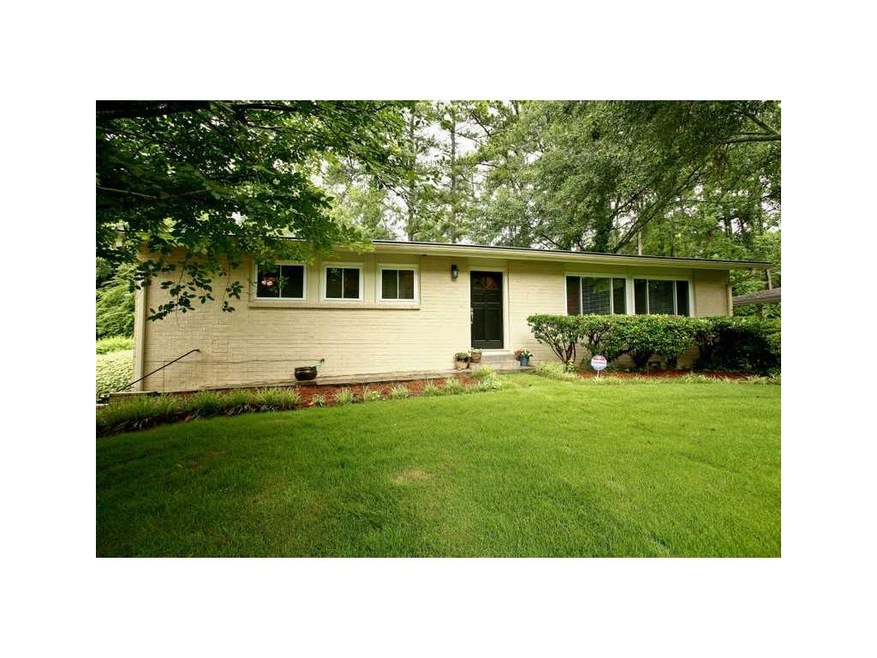 Exterior Front. Charming painted brick ranch on be