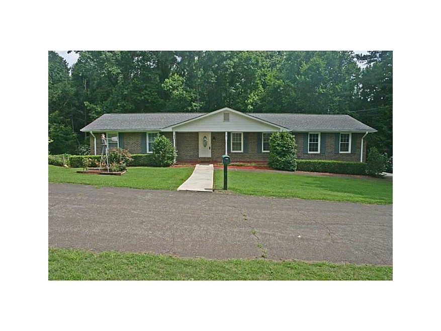 Exterior Front. 1.9 acre surrounds stately 3 bedro