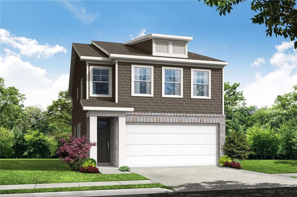 View of front of property with a front lawn and a 
