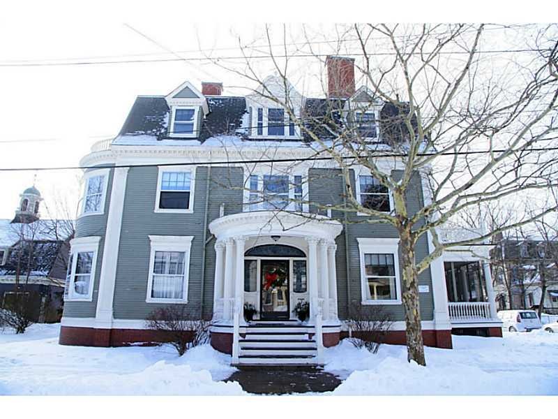 Exterior Front. Regal  Colonial Revival with early
