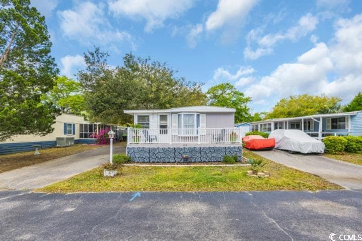 View of front of home with concrete driveway