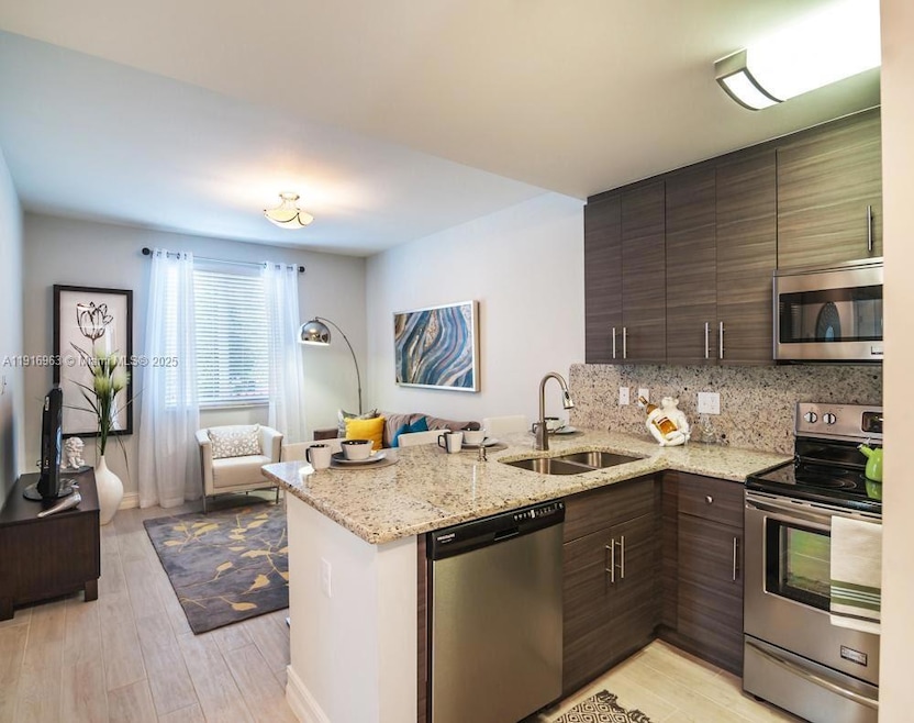 833 SW 13th Ct unit 104, Miami, FL 33135 - photo 1