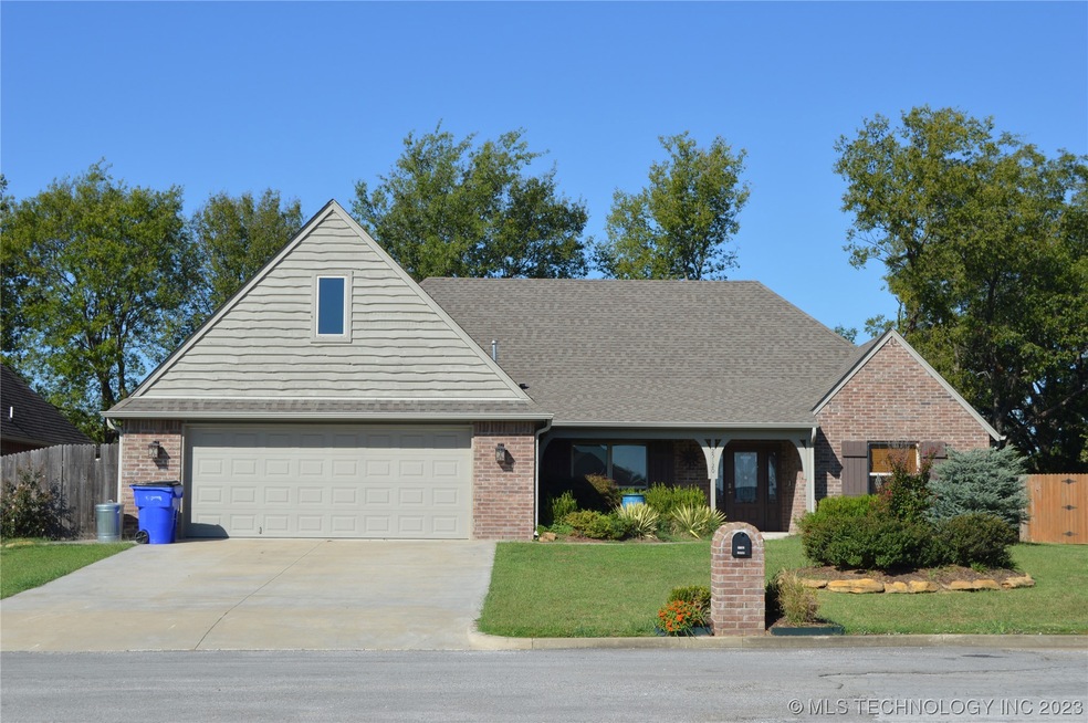 Front Exterior, nicely landscaped.