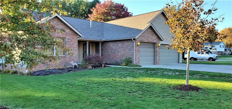 A rare find! A brick ranch with a three-car heated