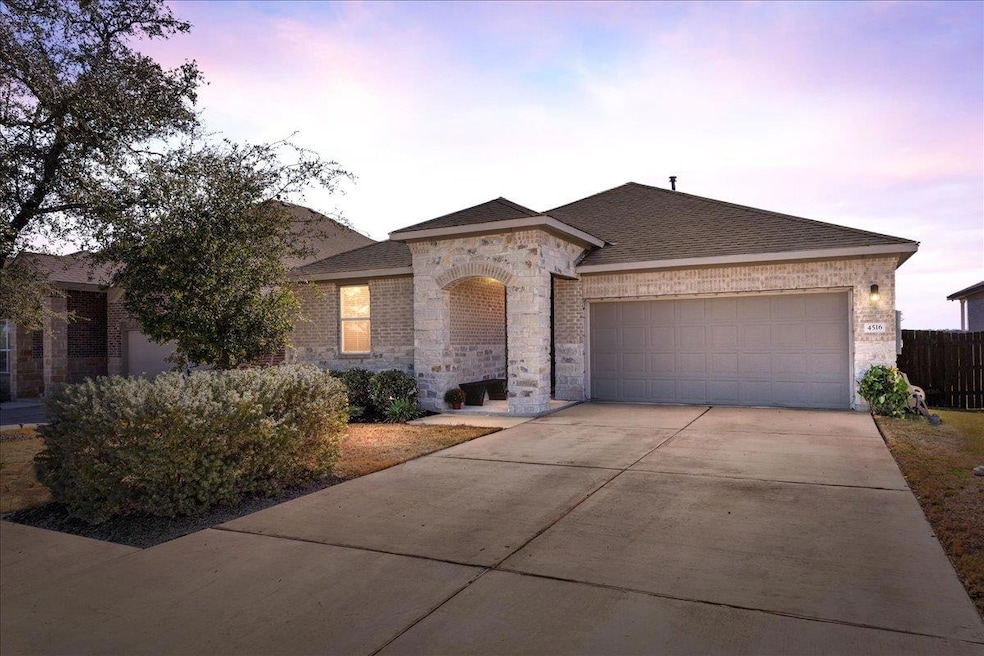 French country style house with brick siding, con