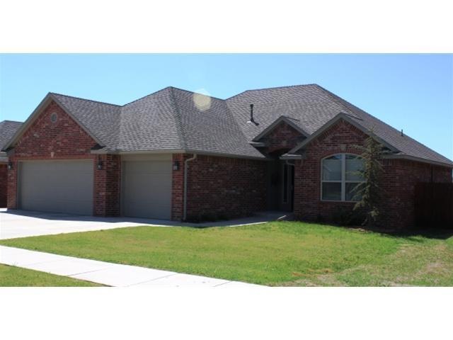 Exterior Front. Beautiful Brick home. 3 car garage