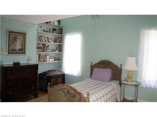 Bedroom. This Bedroom has built-in bookshelves