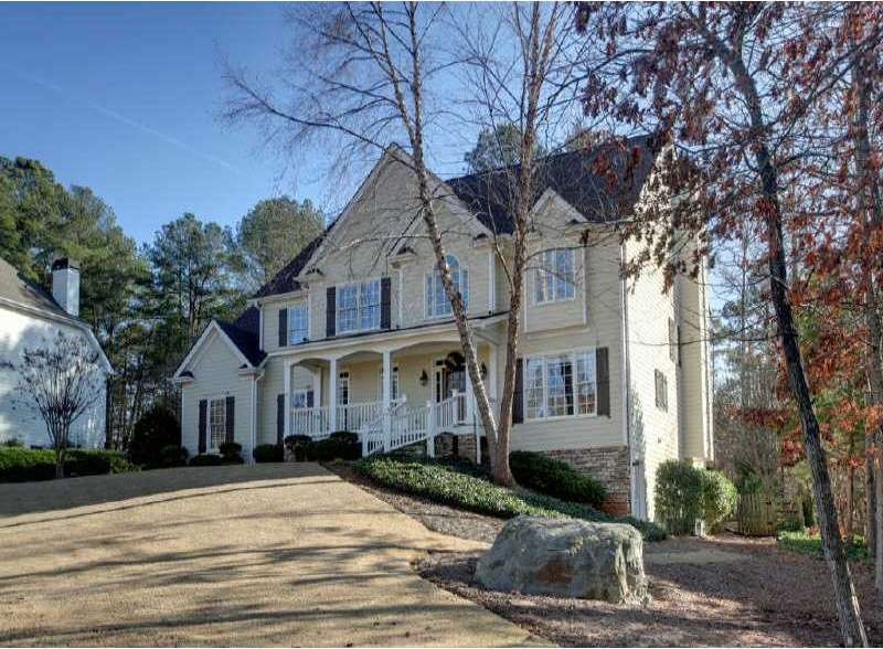 Exterior Front. Immaculate home sits on a beautifu