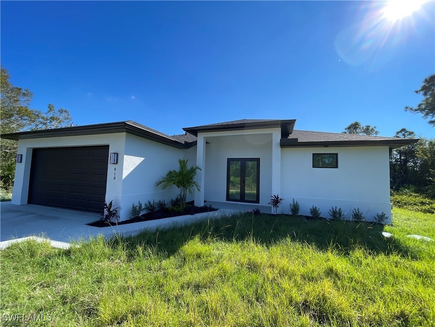View of front of home featuring french doors and a