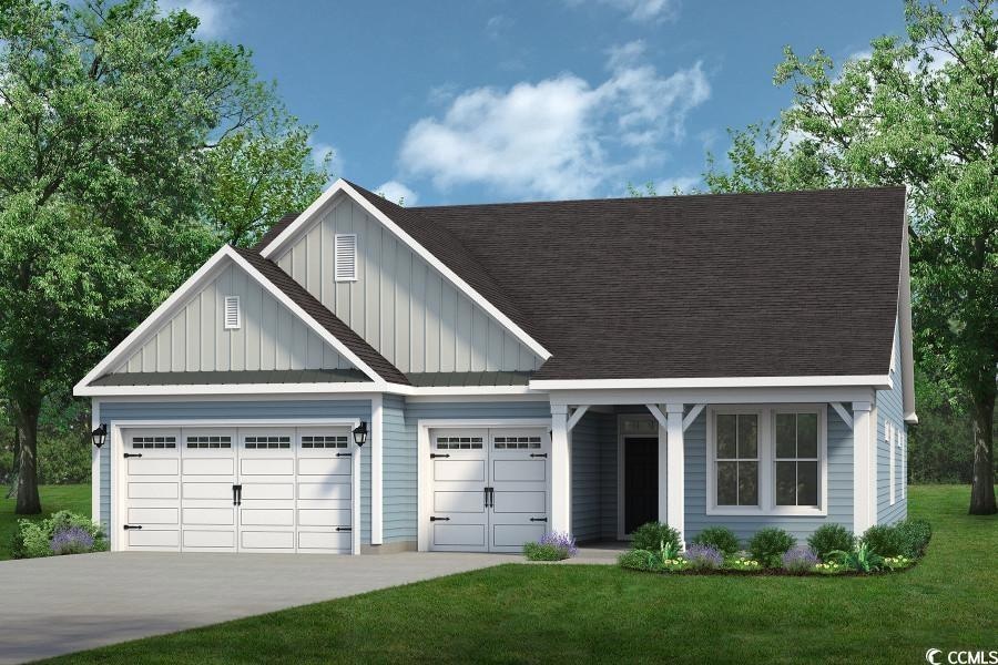 View of front of house with an attached garage, board and batten siding, driveway, a front yard, and roof with shingles