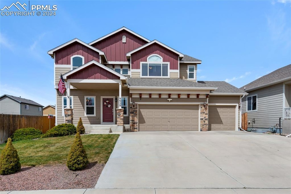 9928 Tomcat Way, Colorado Springs, CO 80925 - photo 1