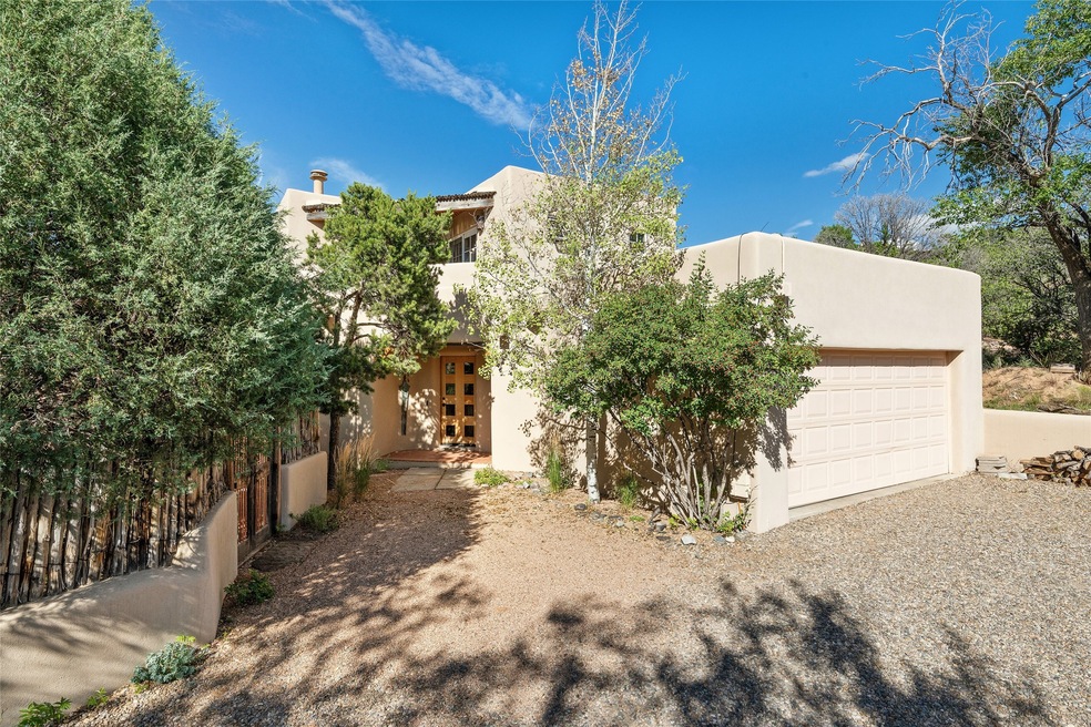 Ample parking, attached garage and fenced perimeter.