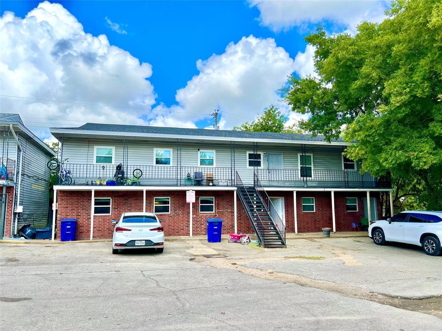 View of property featuring a balcony