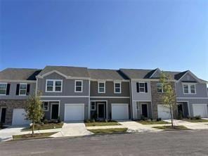 Multi unit property featuring a garage