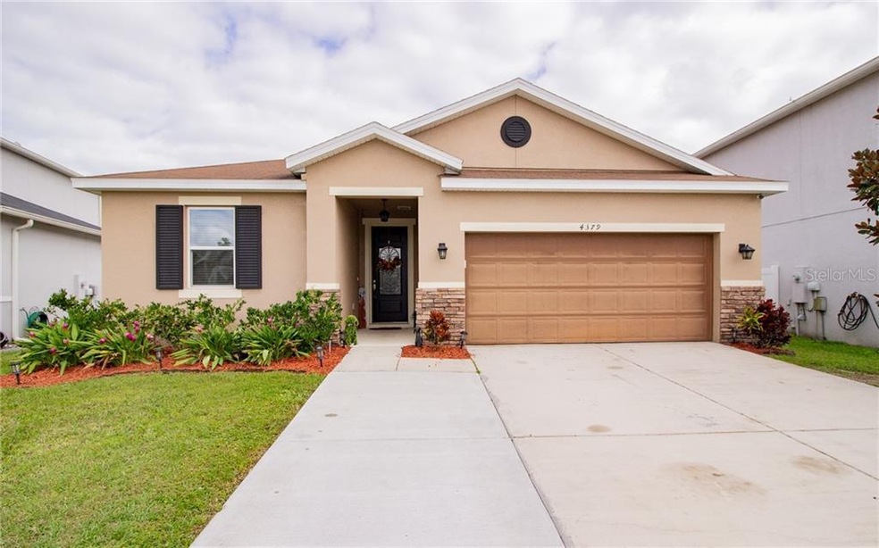 What a beautiful home! Extra wide driveway!