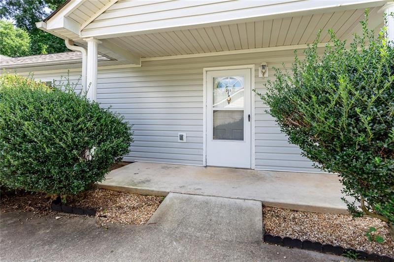 Private entry with a spacious front porch perfect 
