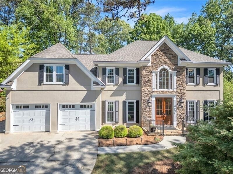 View of front of house with a garage