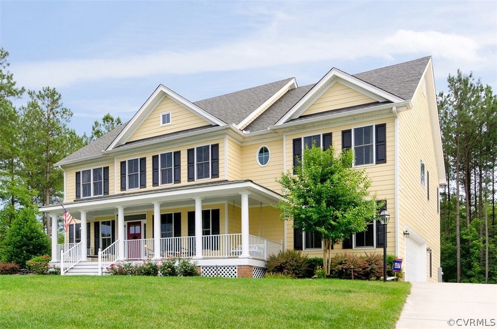 Beautiful exterior with hardi-plank siding and tre