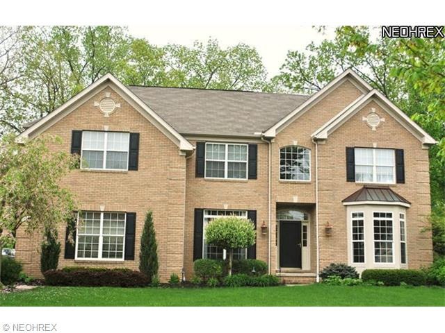 Beautiful brick front colonial with 3-car garage.