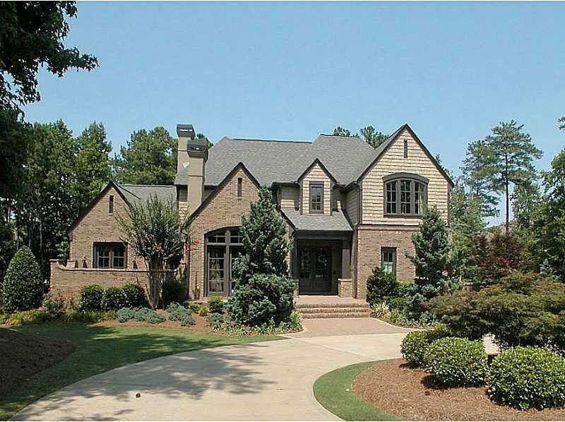 Exterior Front. Lovely brick and shingle home on l